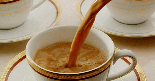 Pouring coffee in a cup